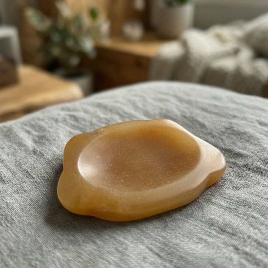 Buddy - Dog shaped crystal worry stone in Yellow Jade lay flat