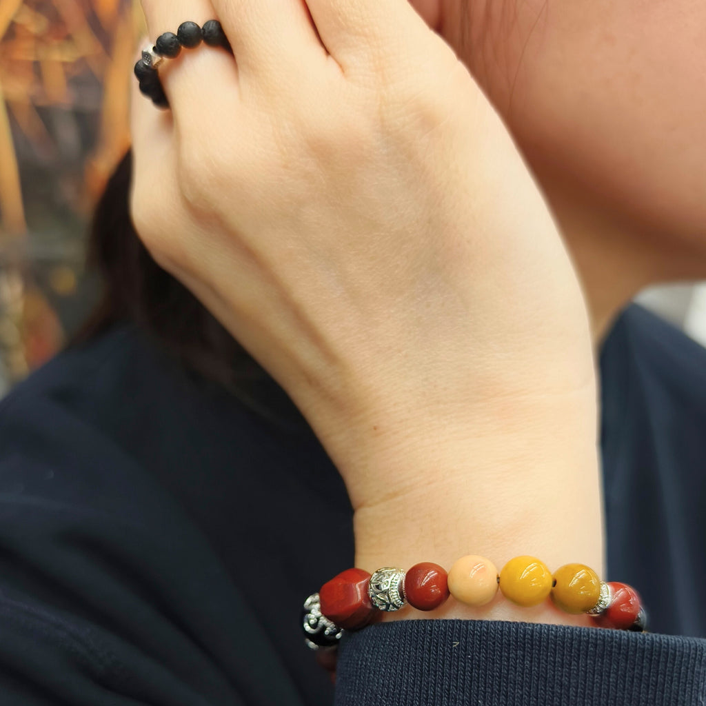 Elaris -  Healing bracelet-Red Jasper, Mookaite, Obsidian worn on wrist at close up shot