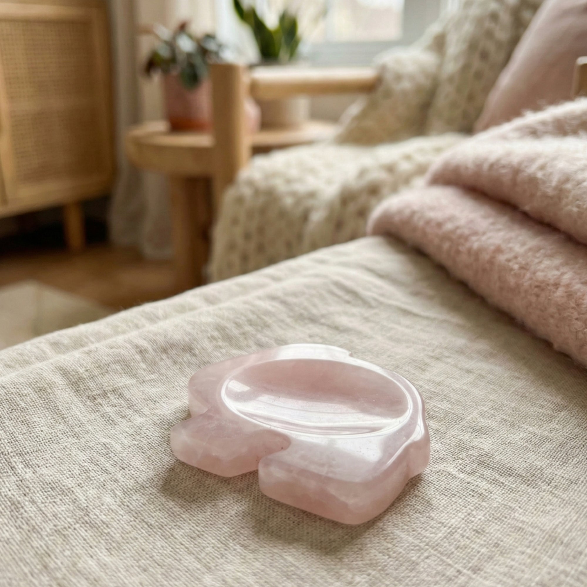 Lumi - Rabbit shaped crystal worry stone in Rose Quartz lay flat