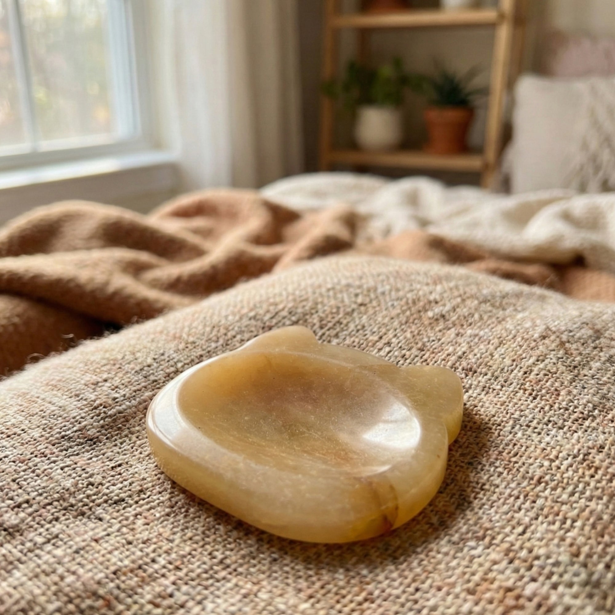 Luna - Cat shaped crystal worry stone in Yellow Jade lay flat